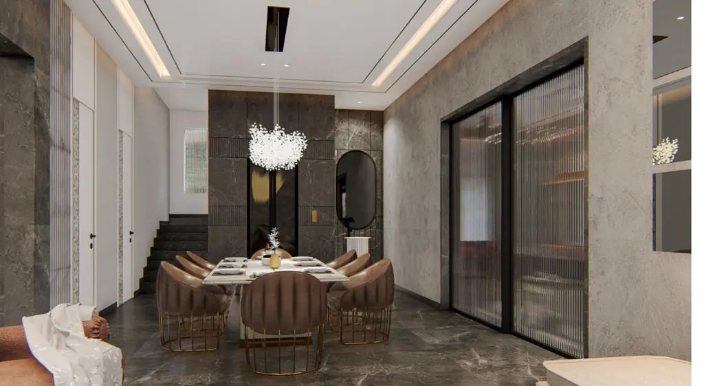 Dining area with dark marble wall and staircase view