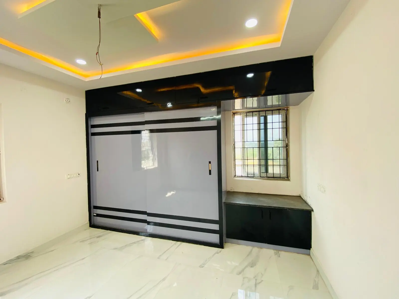 TV unit with sliding glass panel