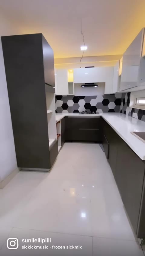 Kitchen with hexagon-pattern backsplash
